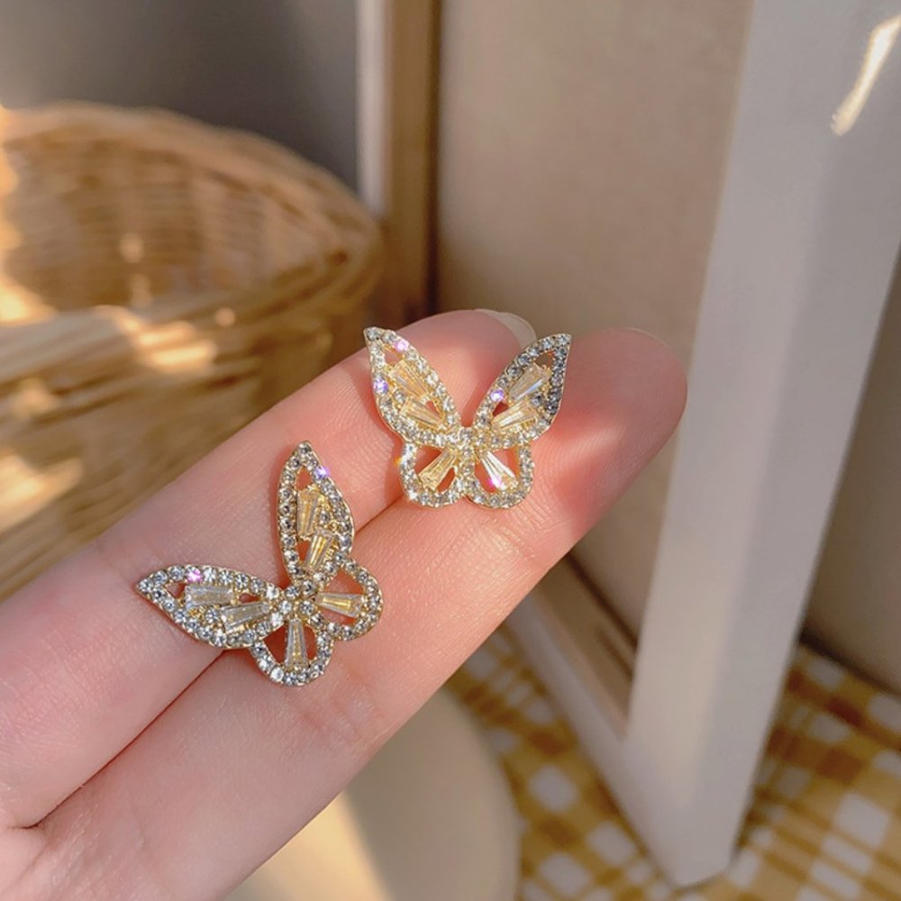 Butterfly stud earrings in gold